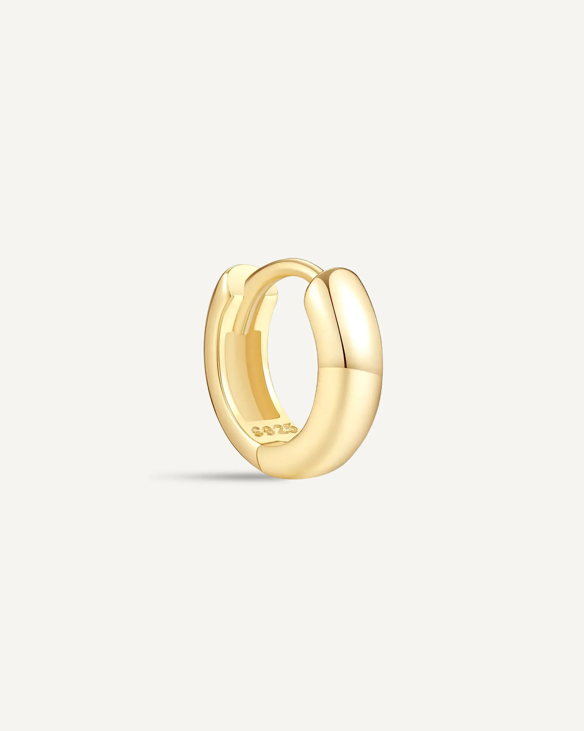 Chunky Bold Huggie Hoops In Gold - Image 6
