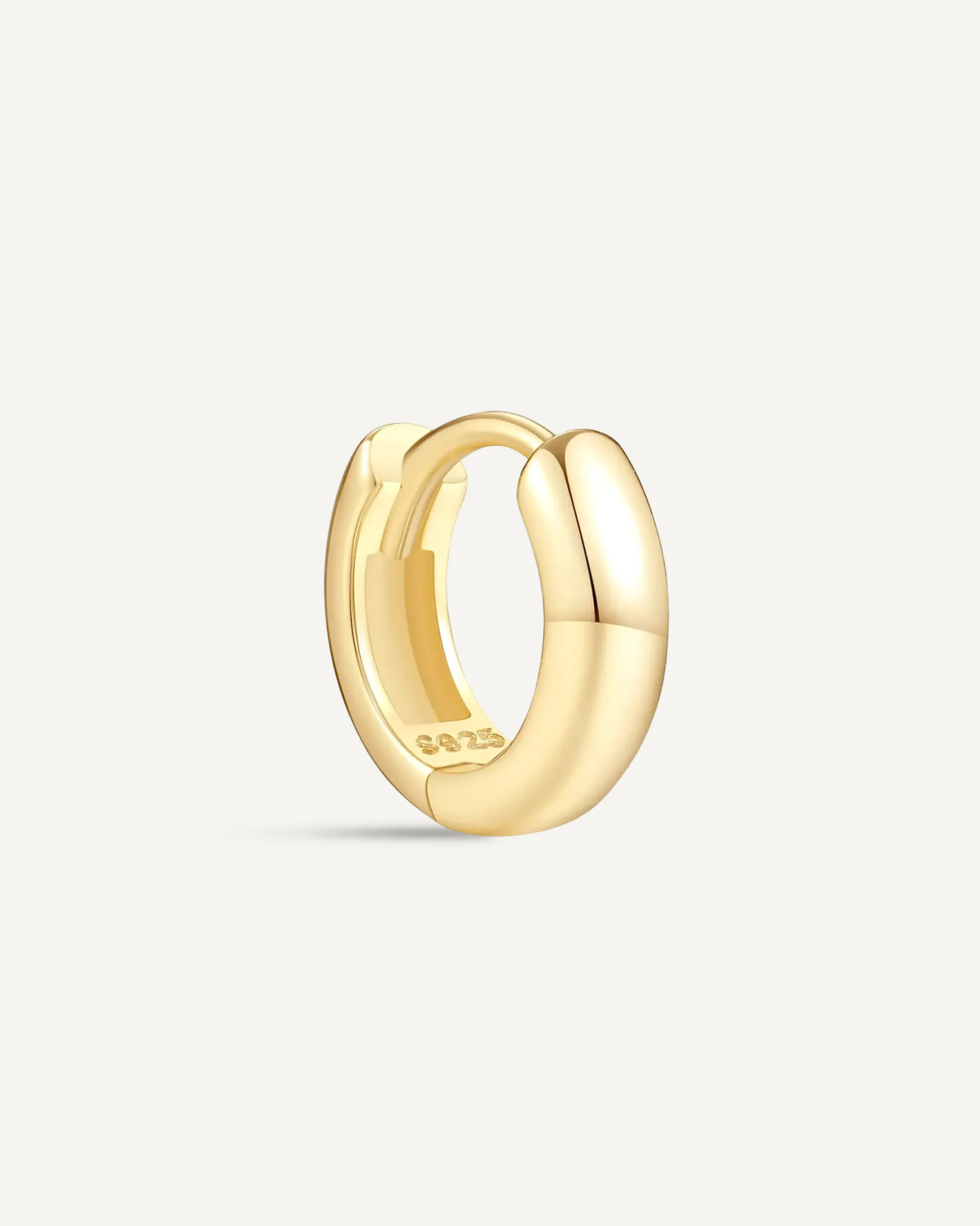 Chunky Bold Huggie Hoops In Gold - Image 8