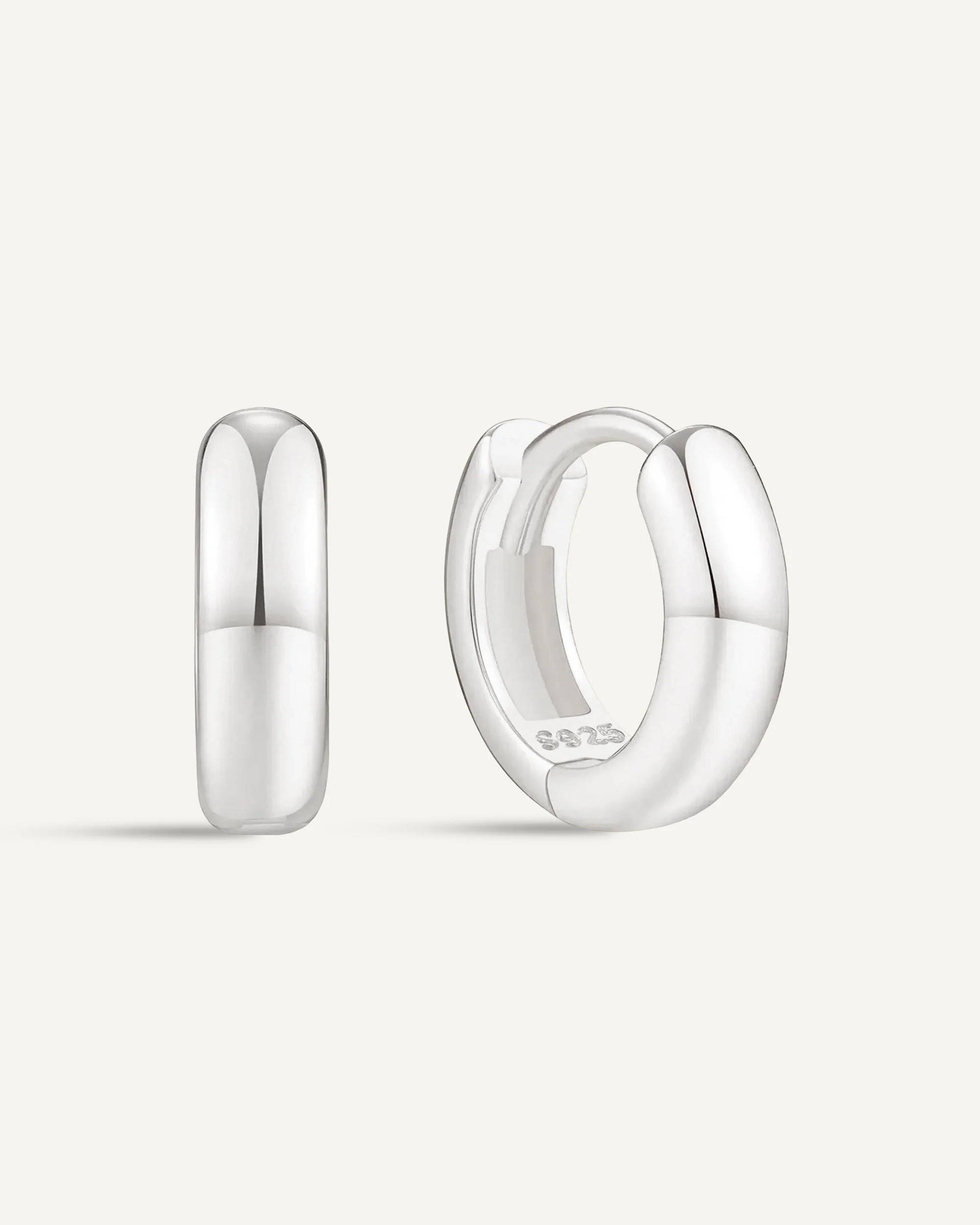 Chunky Bold Huggie Hoops In Silver - Image 9