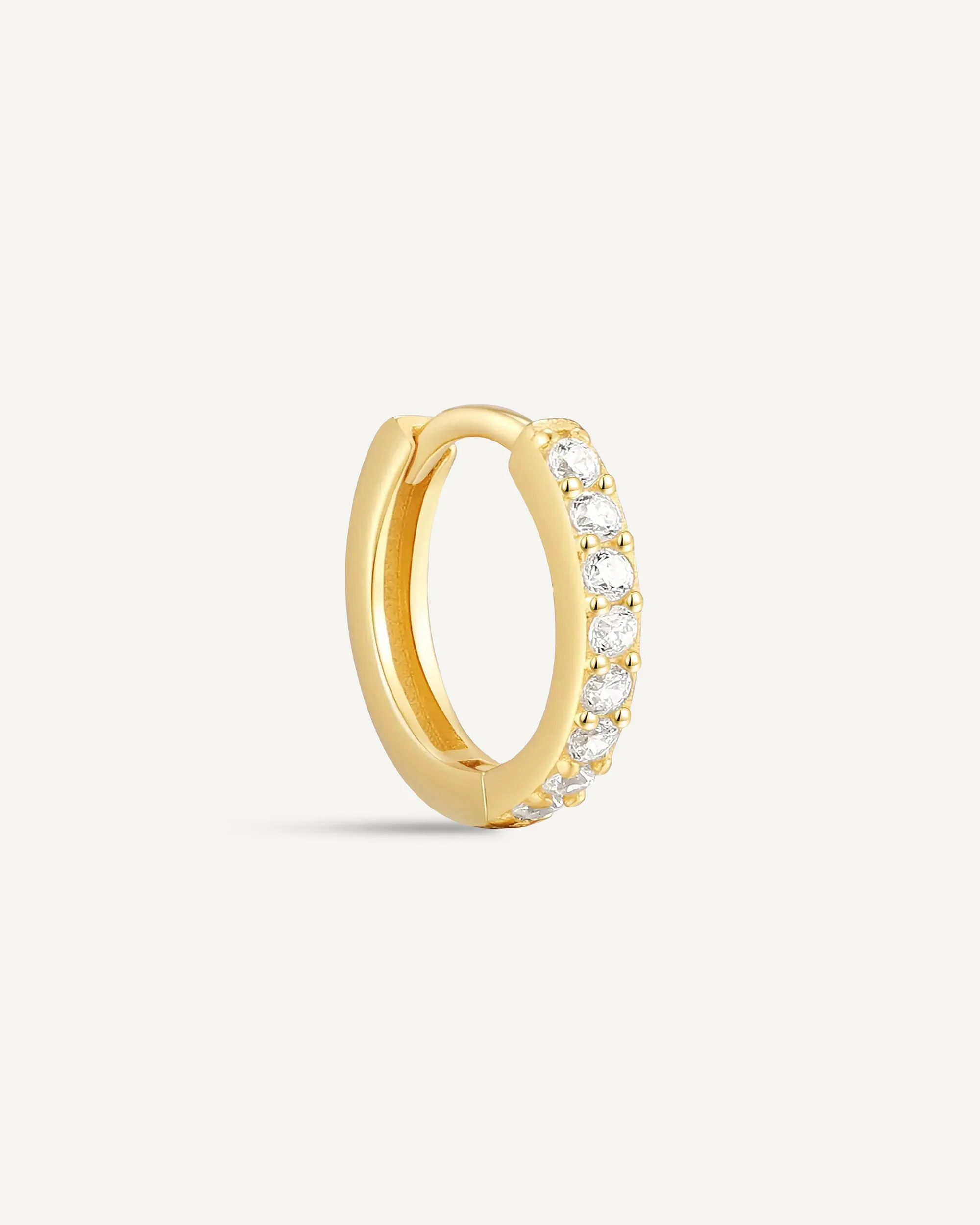 Crystal Paved Huggie Hoops In Gold - Image 10