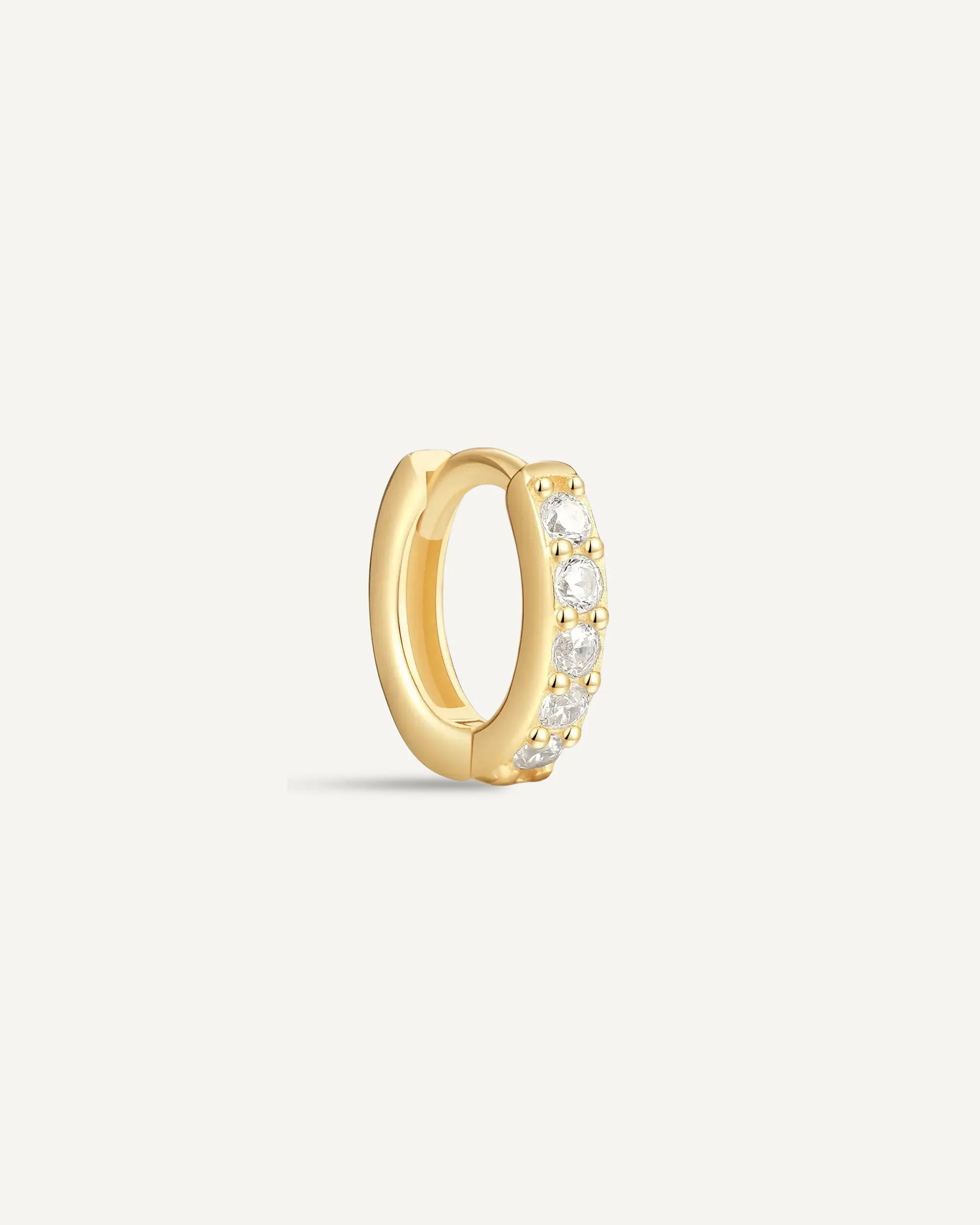 Crystal Paved Huggie Hoops In Gold - Image 6