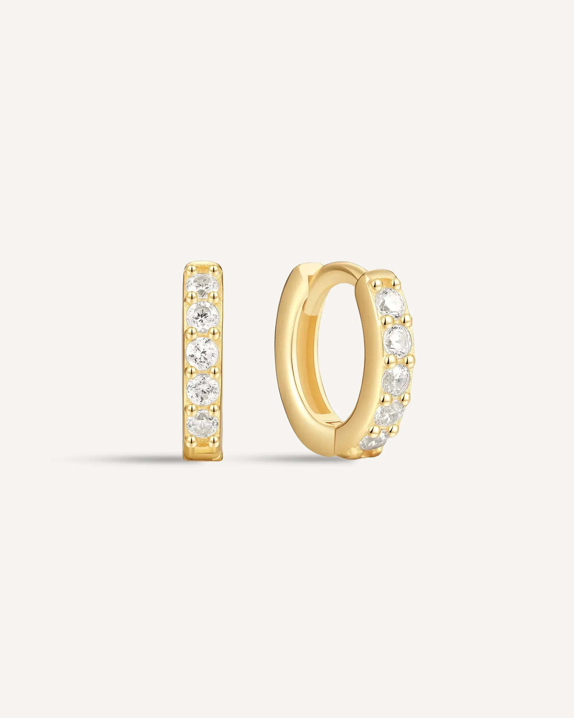 Crystal Paved Huggie Hoops In Gold - Image 7
