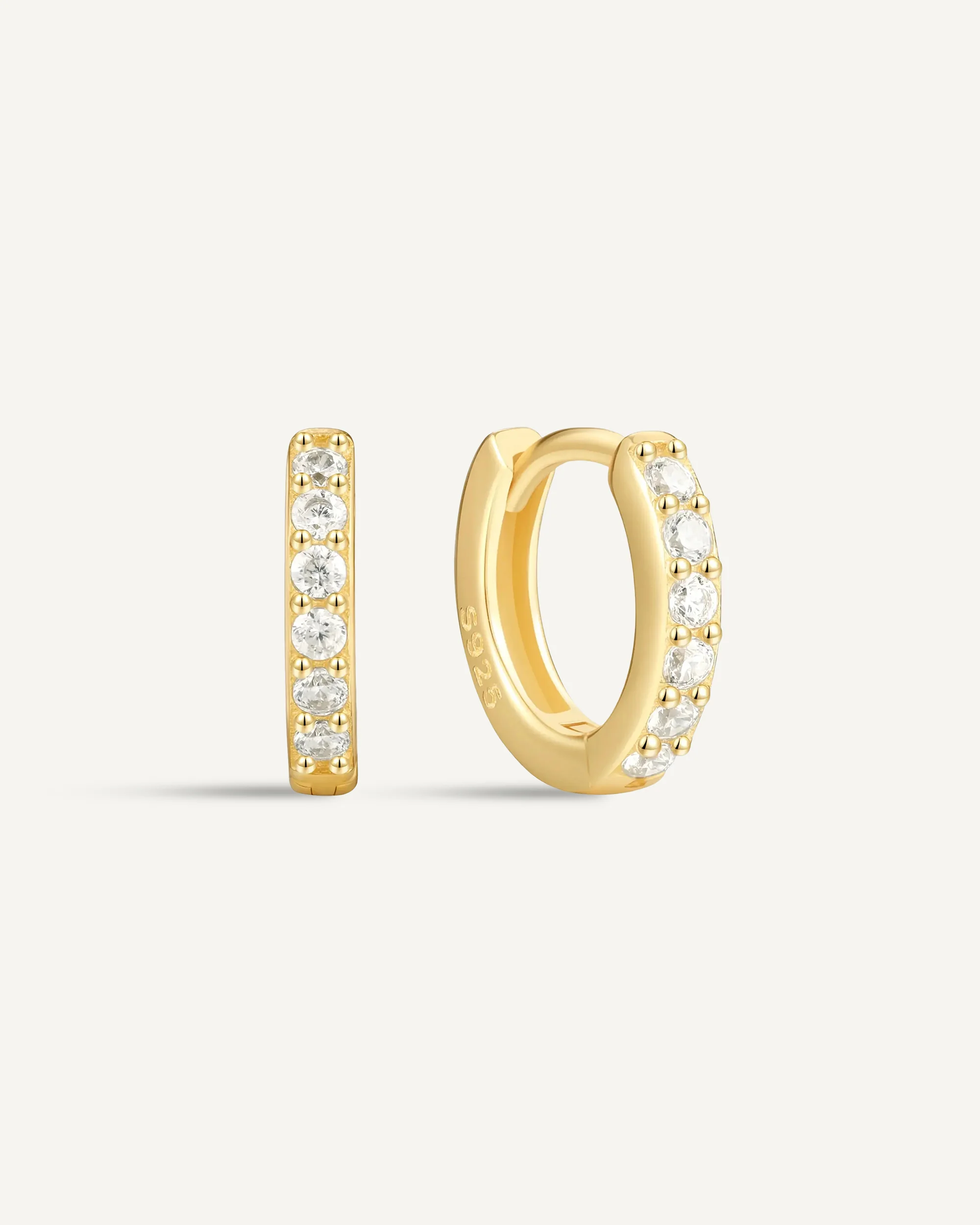 Crystal Paved Huggie Hoops In Gold - Image 9