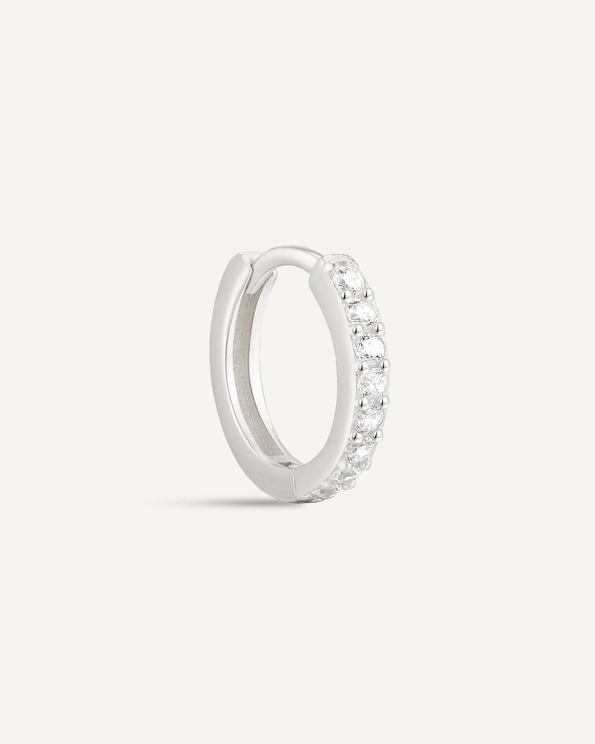 Crystal Paved Huggie Hoops In Silver - Image 10
