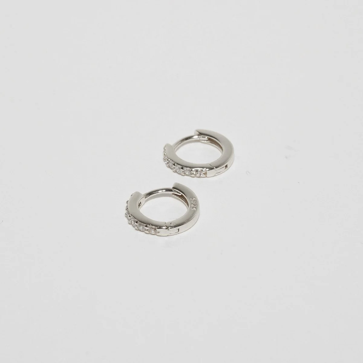 Crystal Paved Huggie Hoops In Silver - Image 3
