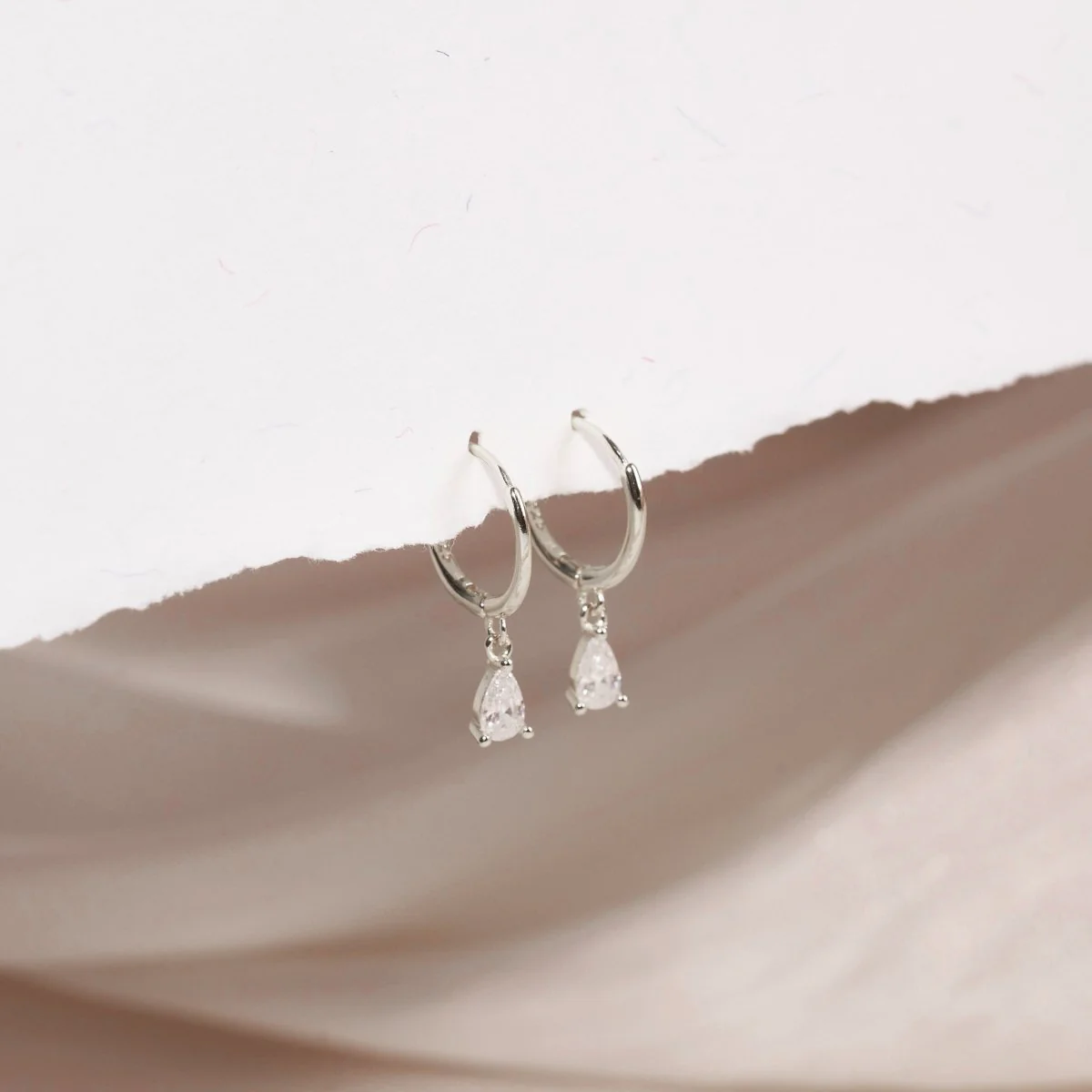 Crystal Teardrop Dangle Hoops in Silver - Image 3