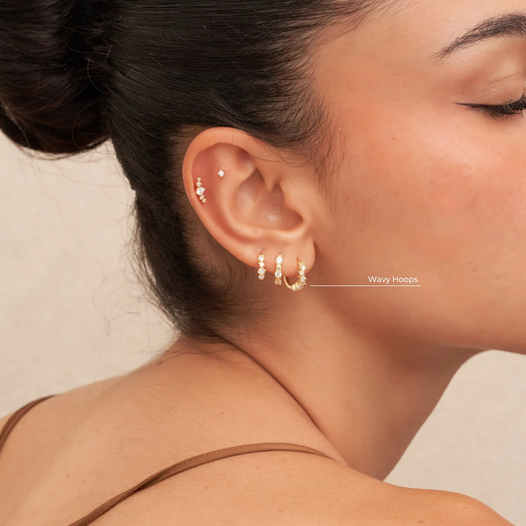 Crystal Wavy Hoop Earrings In Gold - Image 3