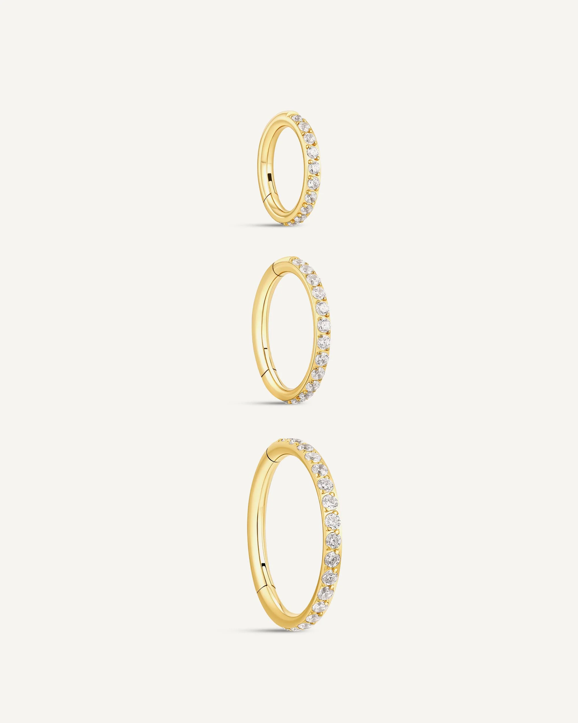 CZ Paved Titanium Clicker Huggies In Gold