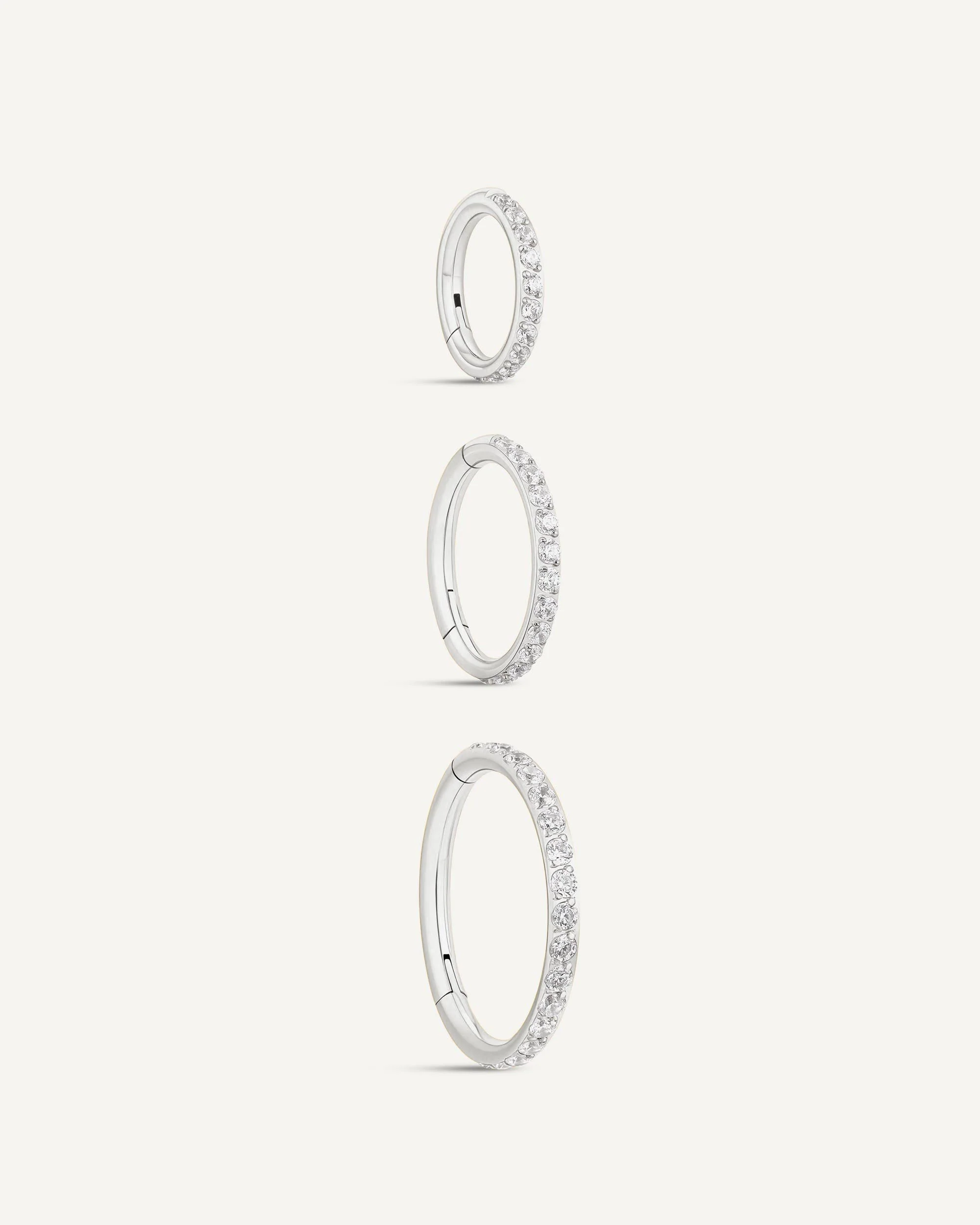 CZ Paved Titanium Clicker Huggies In Silver