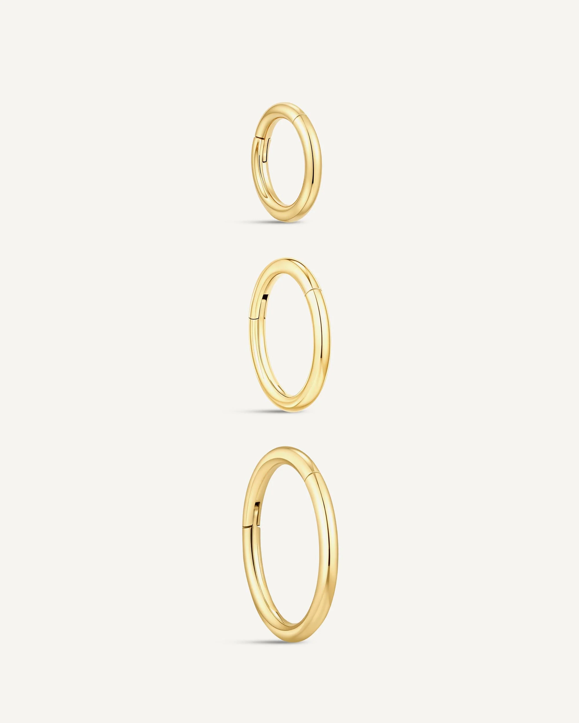 Essential Titanium Clicker Huggies In Gold