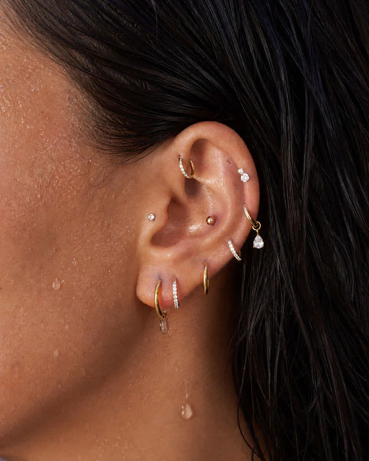 CZ Paved Titanium Clicker Huggies In Gold - Image 2