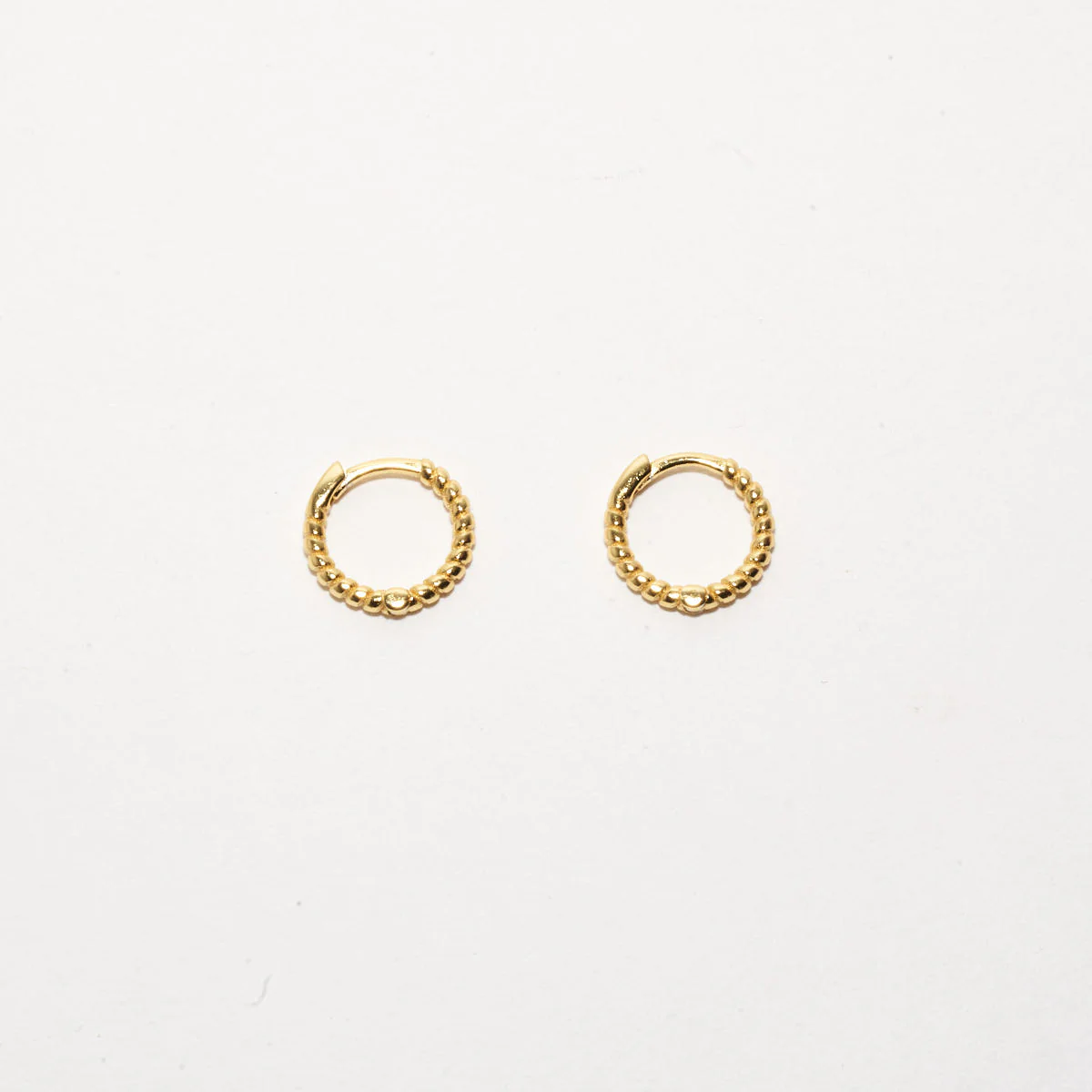Rope Twist Huggie Hoops In Gold - Image 3