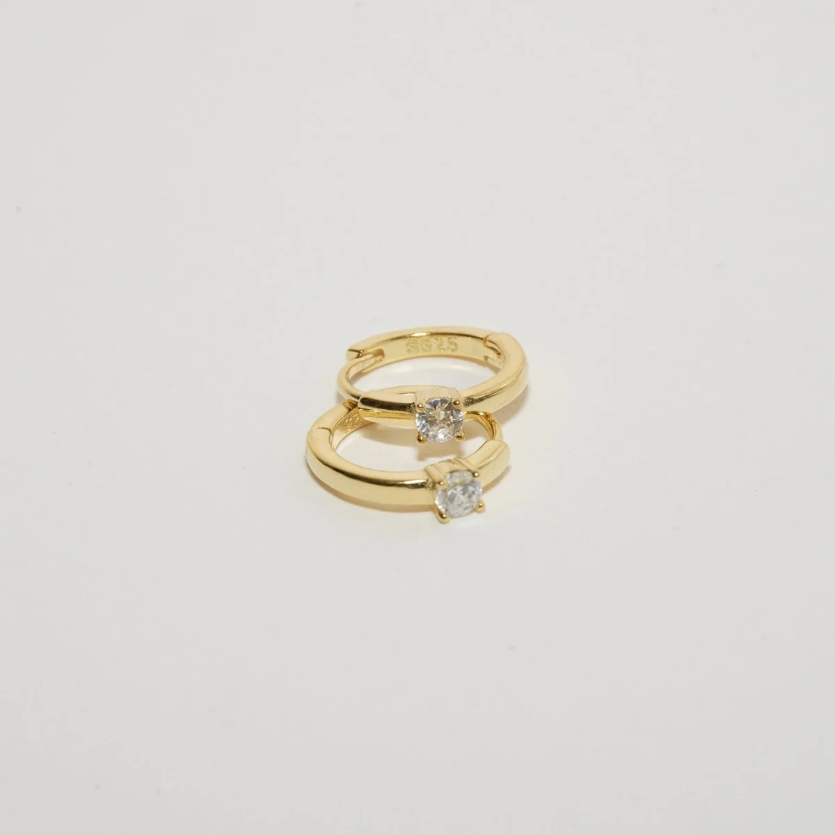 Solitaire Crystal Huggie Hoops In Gold - Image 3