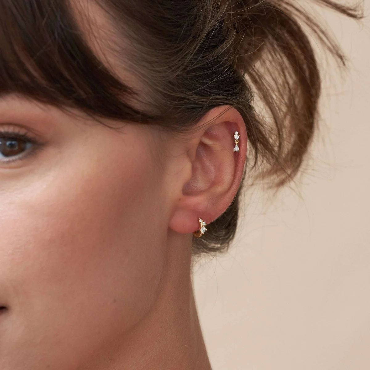 Sprinkle Crystal Huggie Hoops In Gold - Image 4