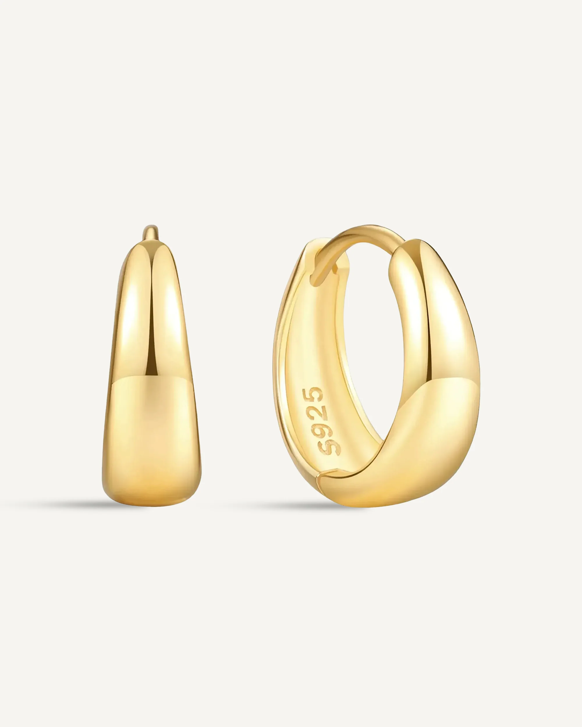 Tapered Huggie Hoops In Gold - Image 11