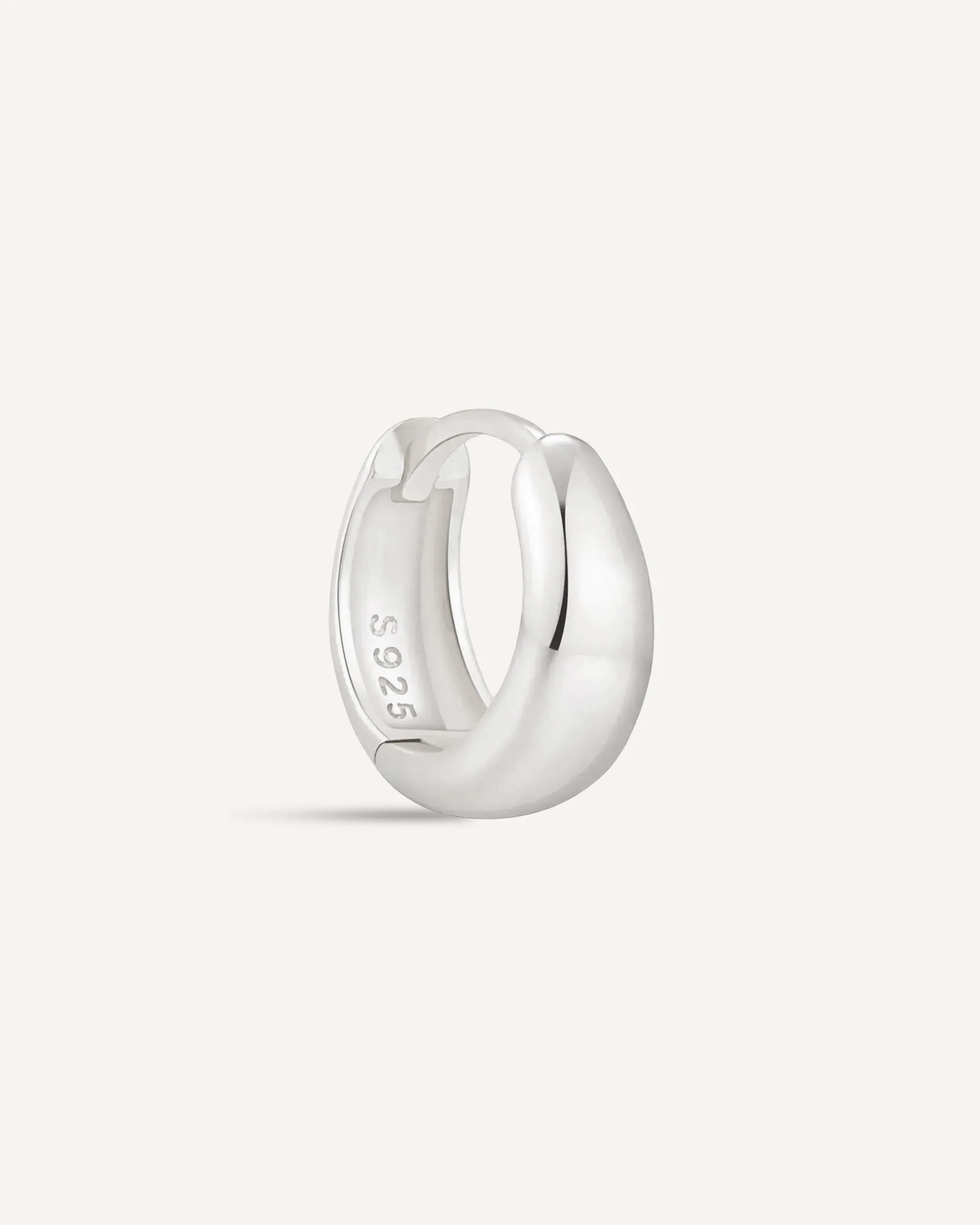 Tapered Huggie Hoops In Silver - Image 8