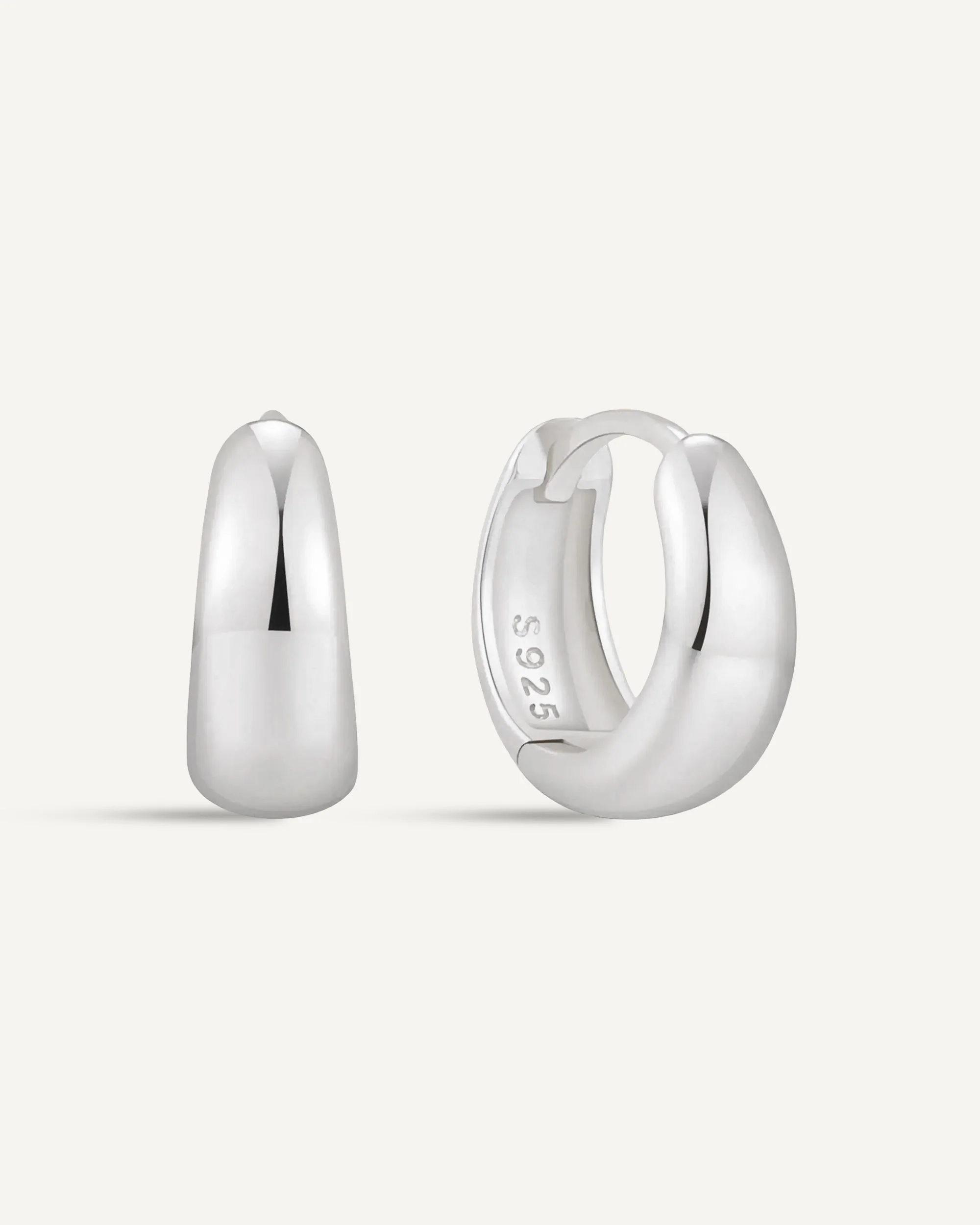 Tapered Huggie Hoops In Silver - Image 9