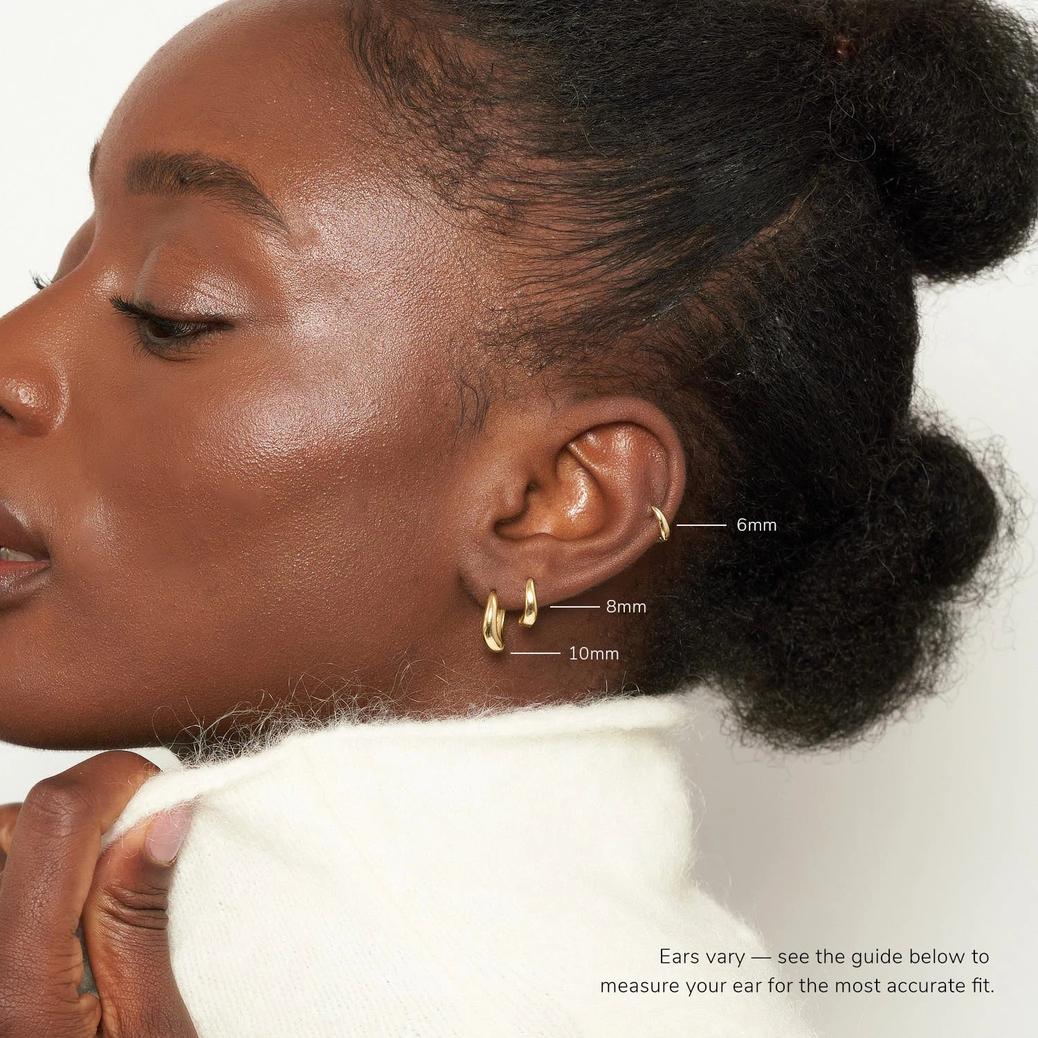 Tapered Wavy Huggie Hoops In Gold - Image 4
