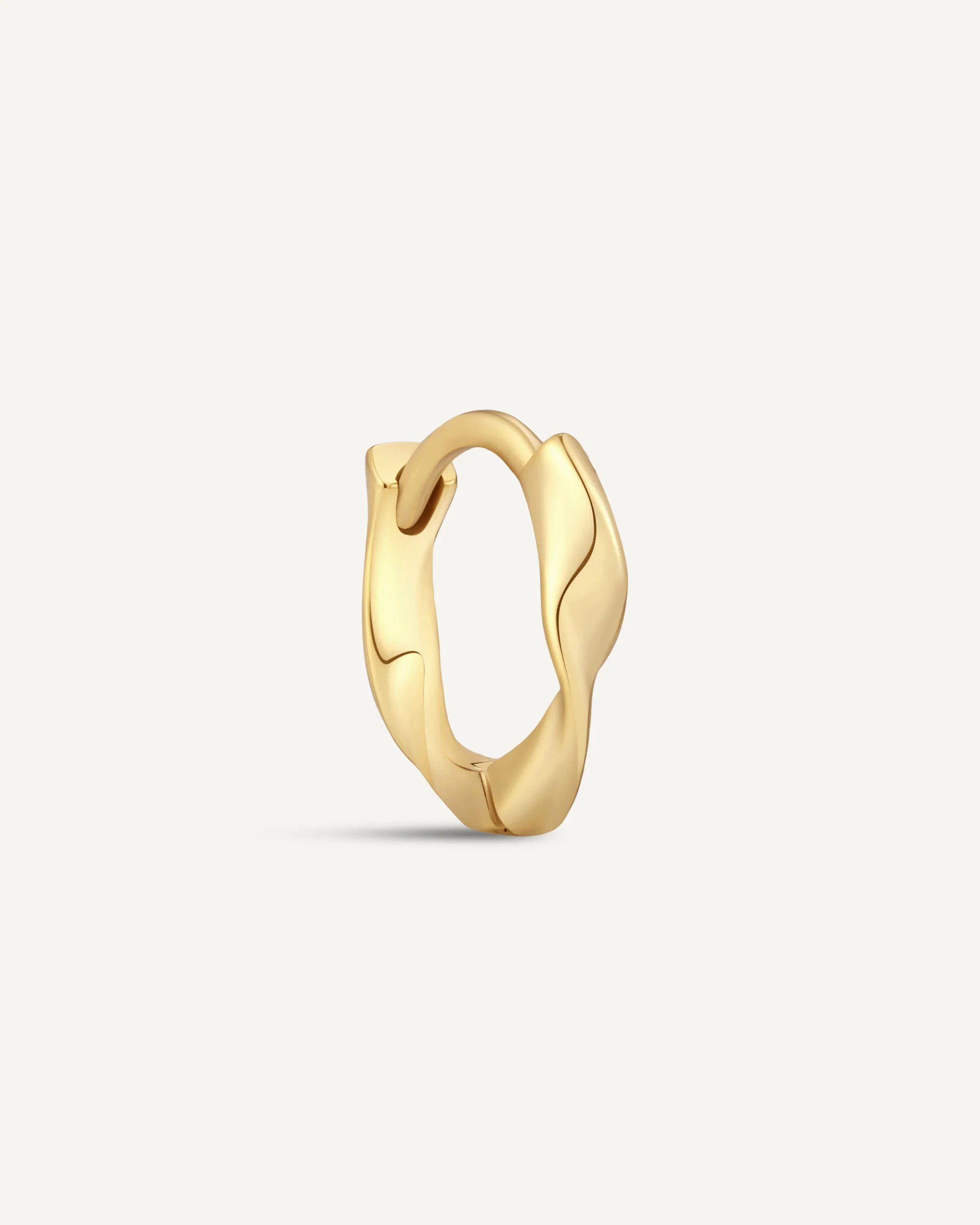 Twisted Huggie Hoops In Gold - Image 10