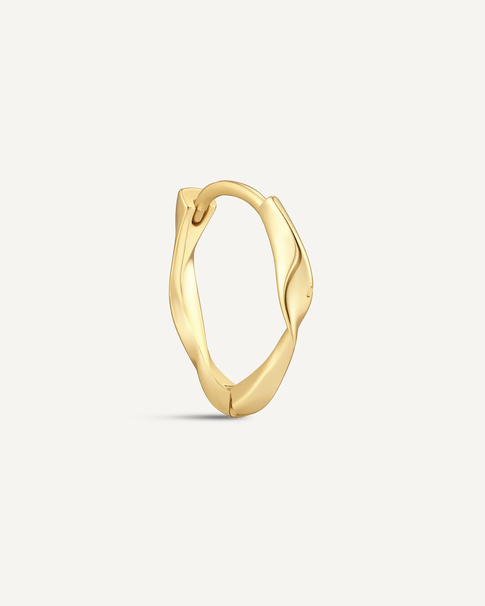Twisted Huggie Hoops In Gold - Image 12