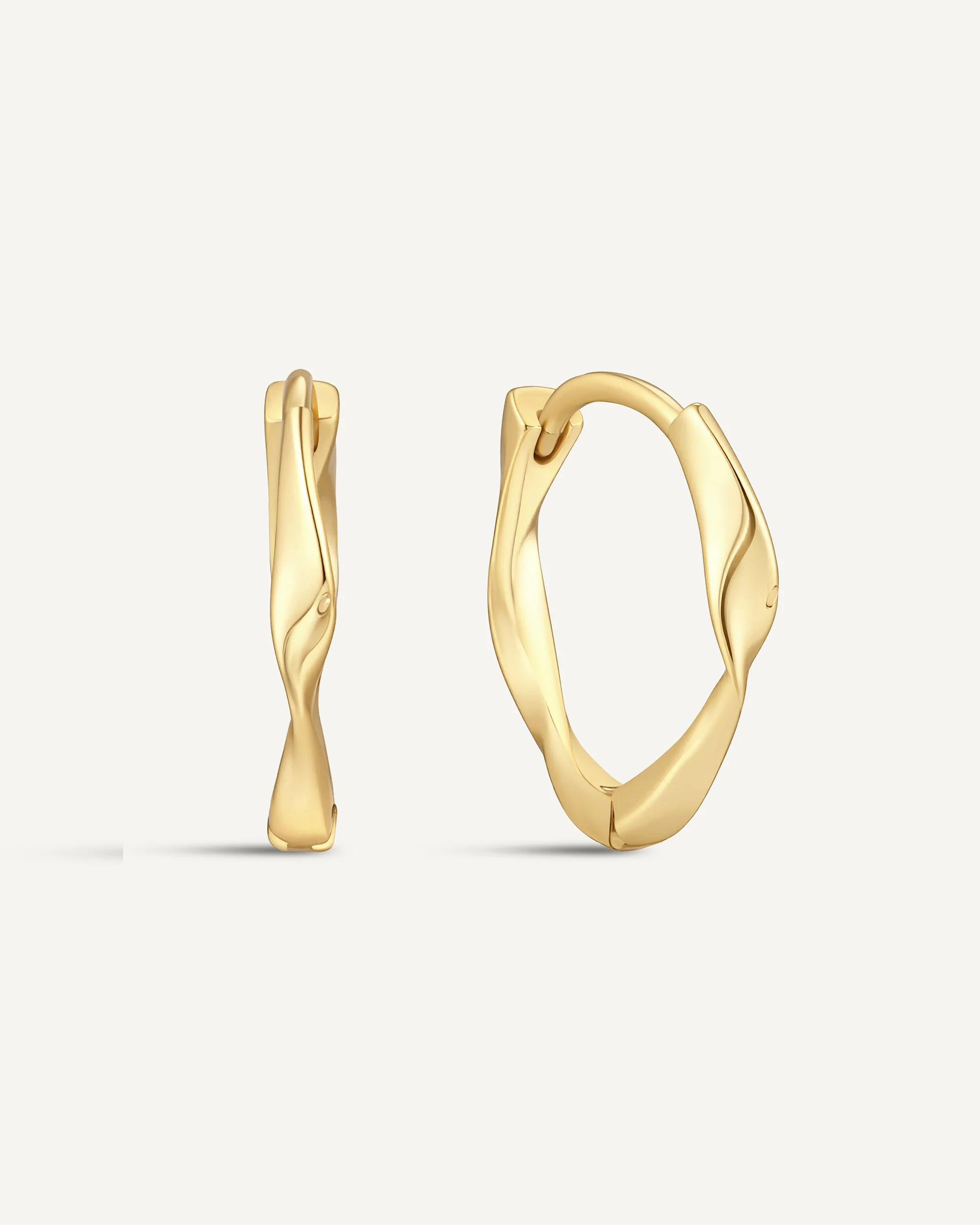 Twisted Huggie Hoops In Gold - Image 13