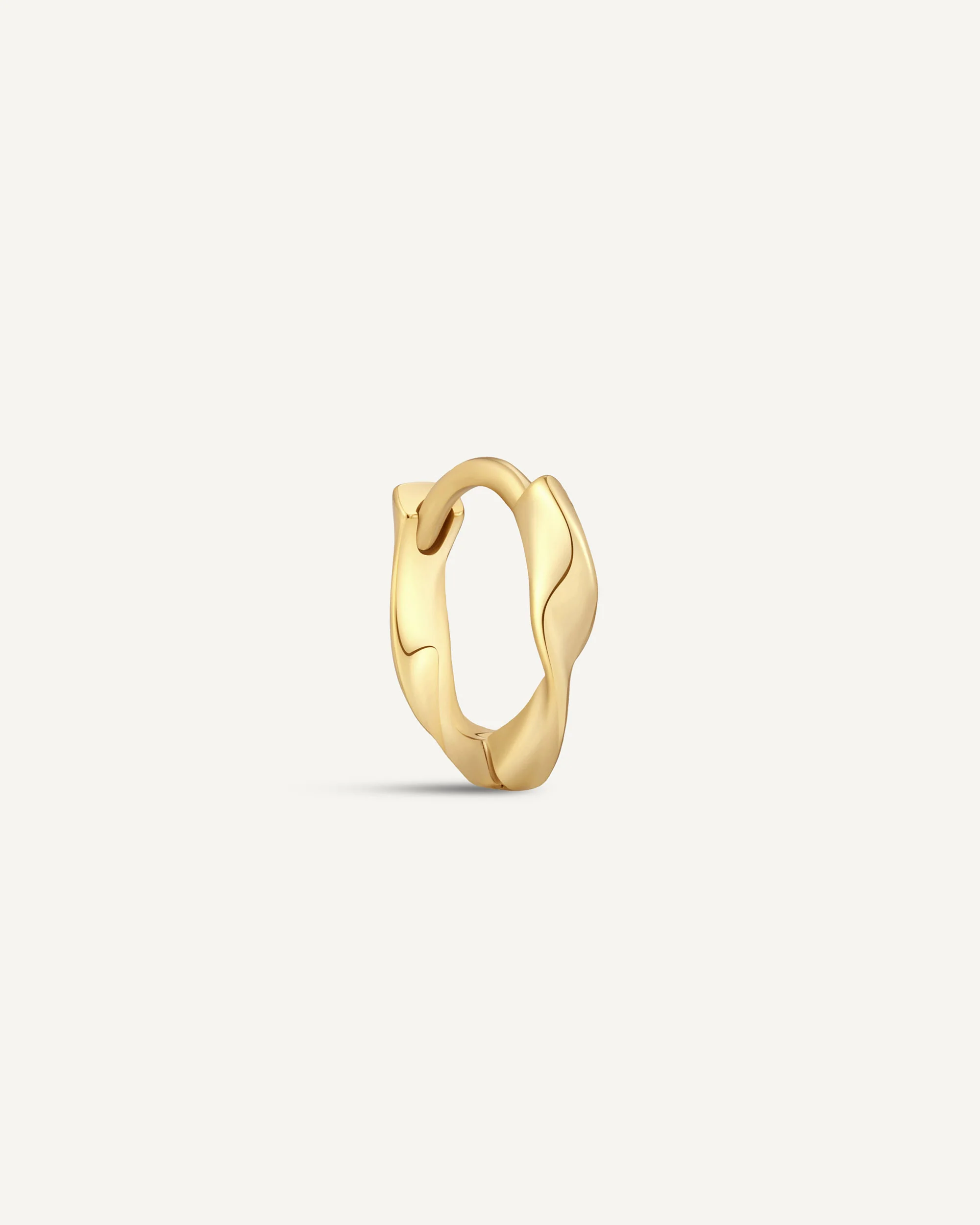 Twisted Huggie Hoops In Gold - Image 8