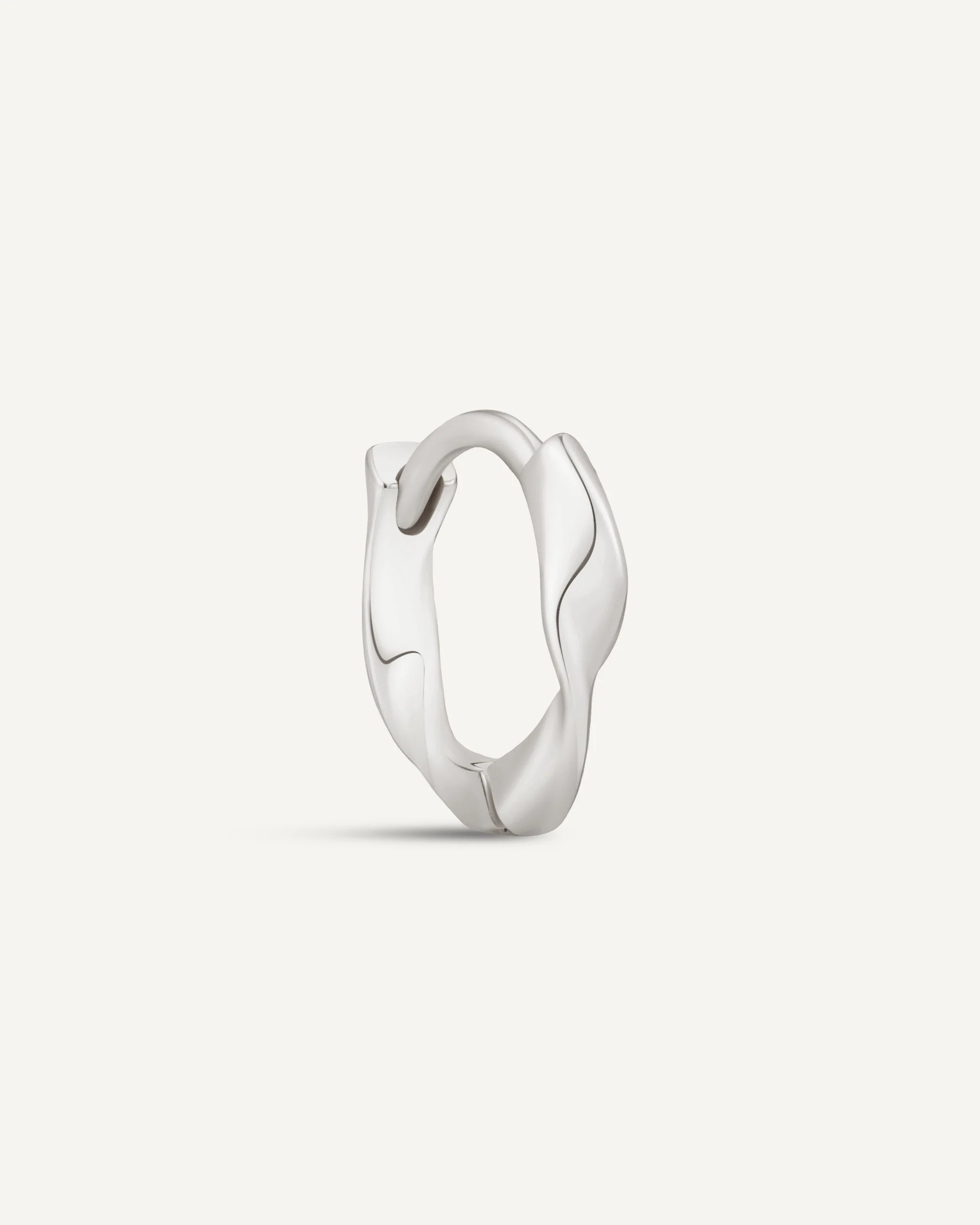 Twisted Huggie Hoops In Silver - Image 10