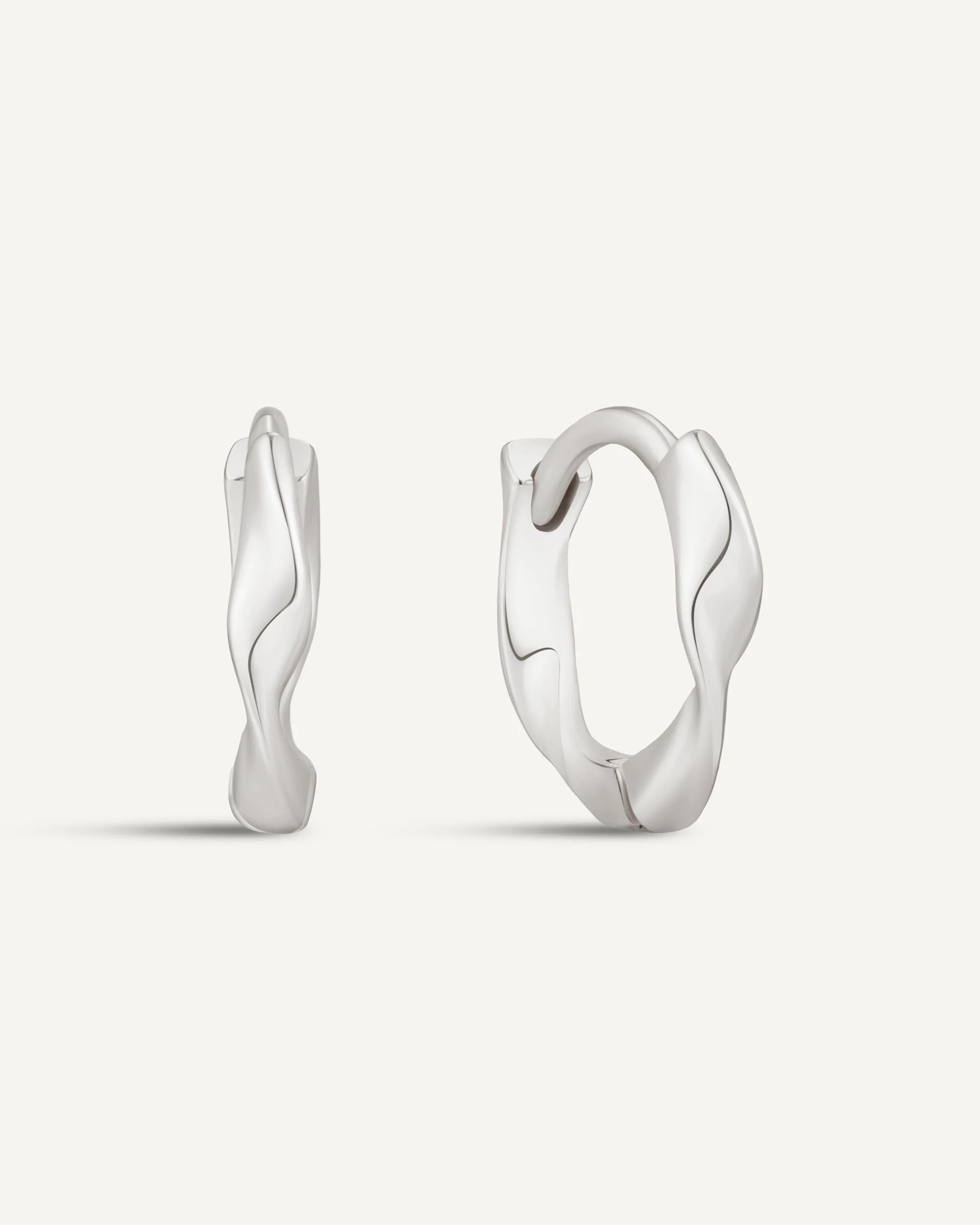Twisted Huggie Hoops In Silver - Image 11
