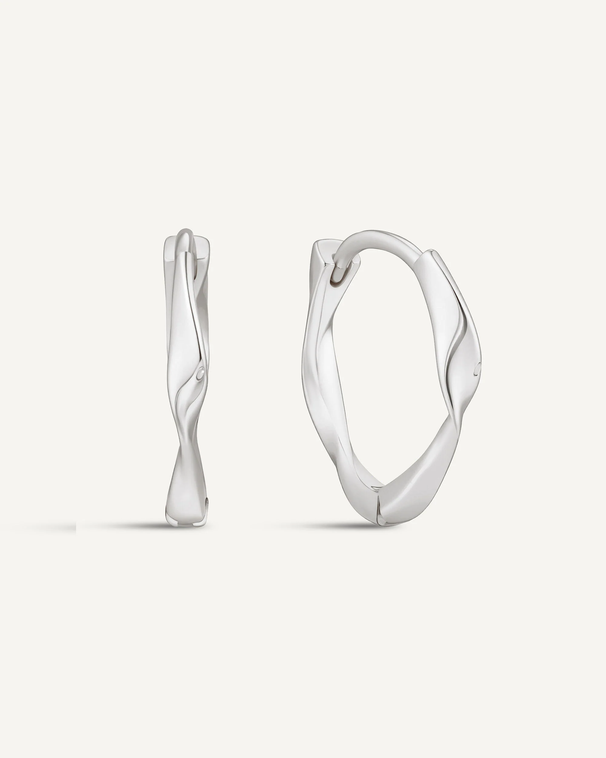 Twisted Huggie Hoops In Silver - Image 13